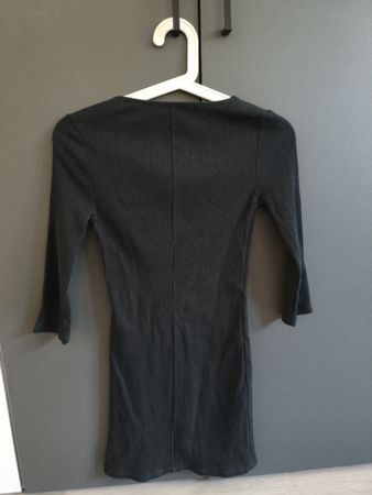 Vestito corto nero a coste maniche 3/4 usato