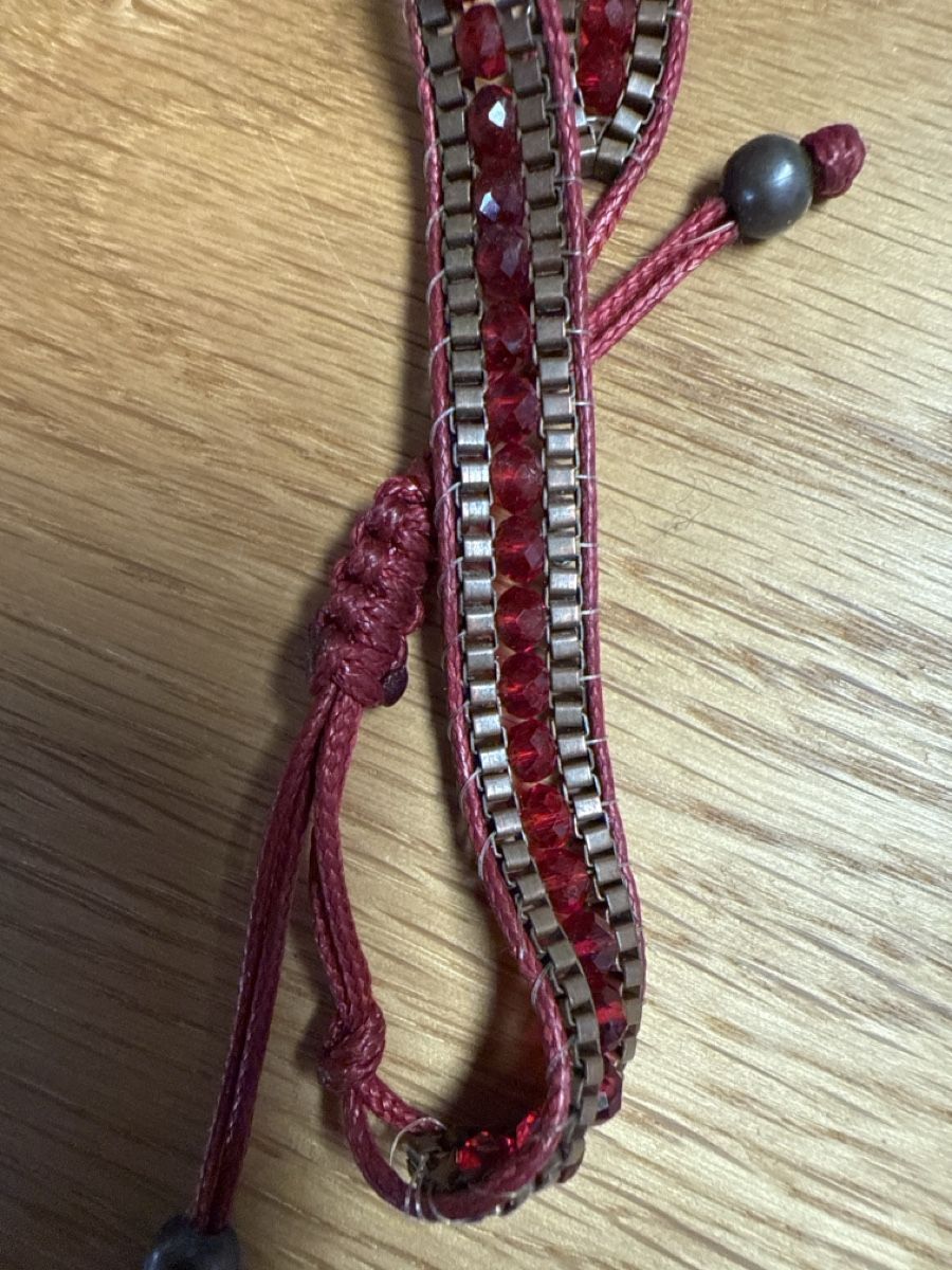 Bracciali & Braccialetti: Armband geflochten rot mit Perlen – Usato da Auenstein venduto da moin. 1
