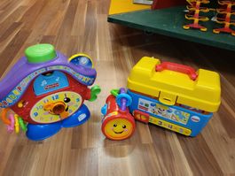 Ein Fisher Price Spielzeug nach Wahl K8