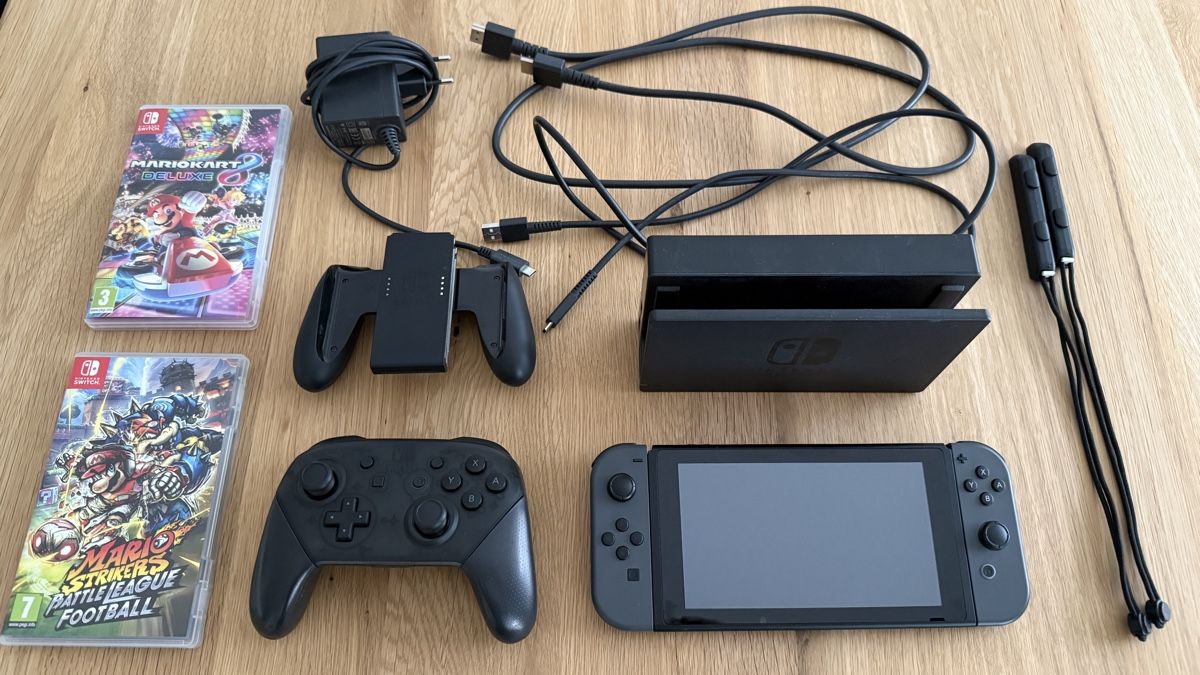 Nintendo Console: Nintendo Switch inkl. Controller und Spiele – Nuovo (secondo la descrizione) da Interlaken venduto da xCarlos3