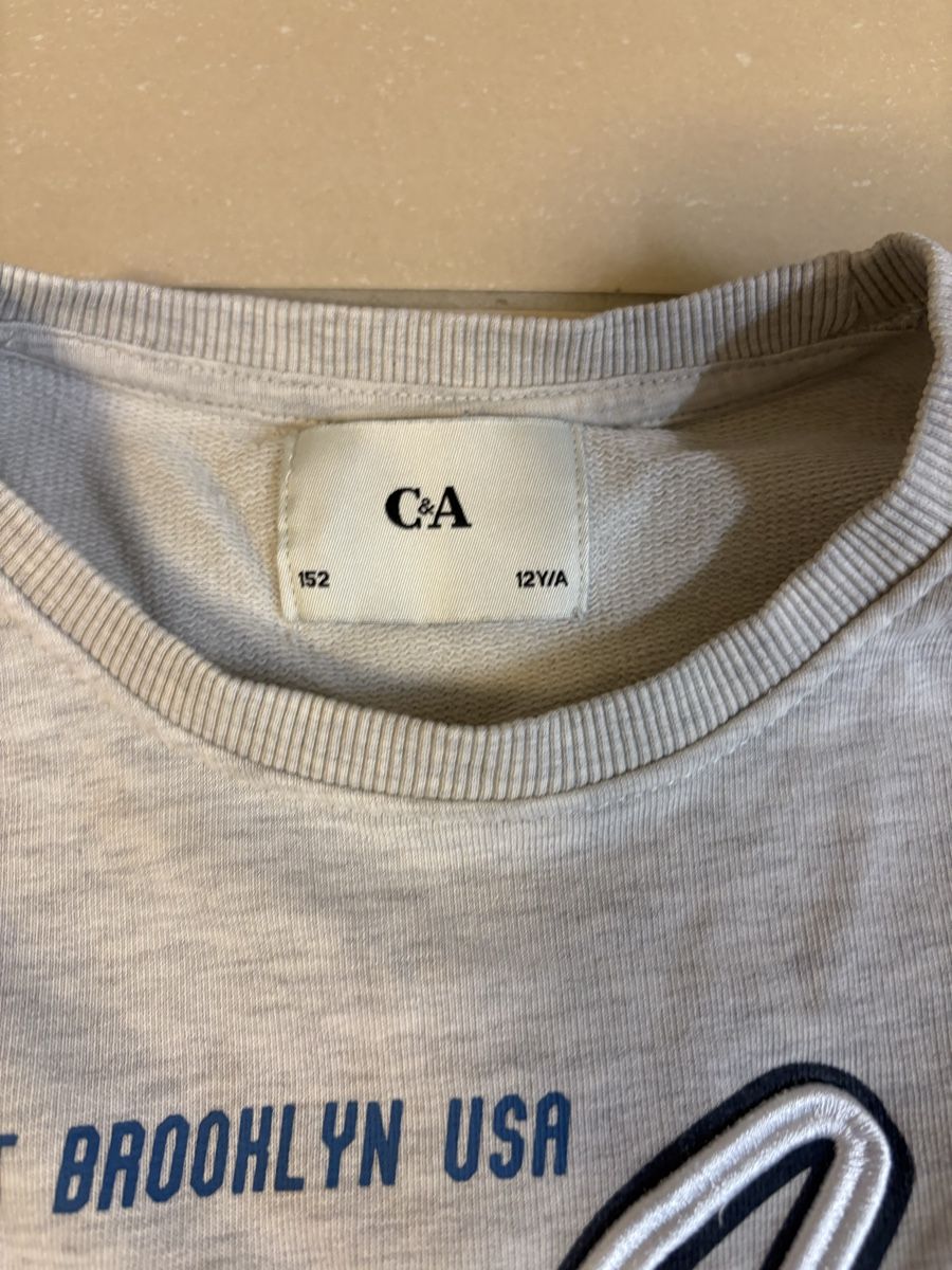 C&A Maglioni & Felpe: Grauer C&A New York Pullover Grösse 152 – Usato da Witterswil venduto da gandia05 1
