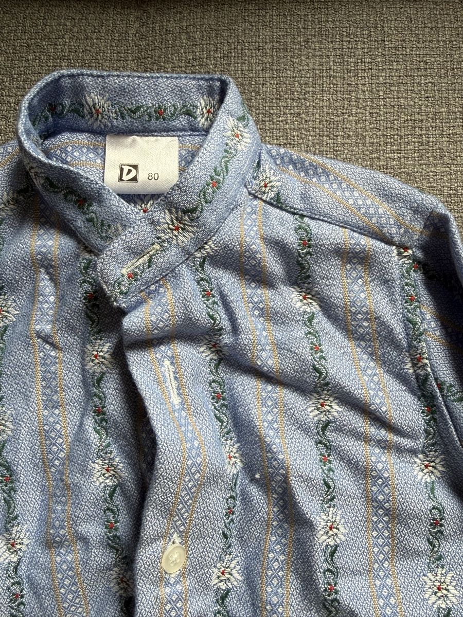 Camicie, Top & T-shirt: Hübsches Kinderhemdli Gr. 80 mit traditionellem Muster – Nuovo e nell'imballaggio originale da Flamatt venduto da nun_8lxg 1