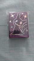 Pack of Paldean Fates ETB sleeves, Mimikyu (65 sleeves)