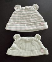 2 Babymützen (0–3 Monate)