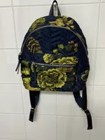 Blauer Rucksack mit grünem Muster