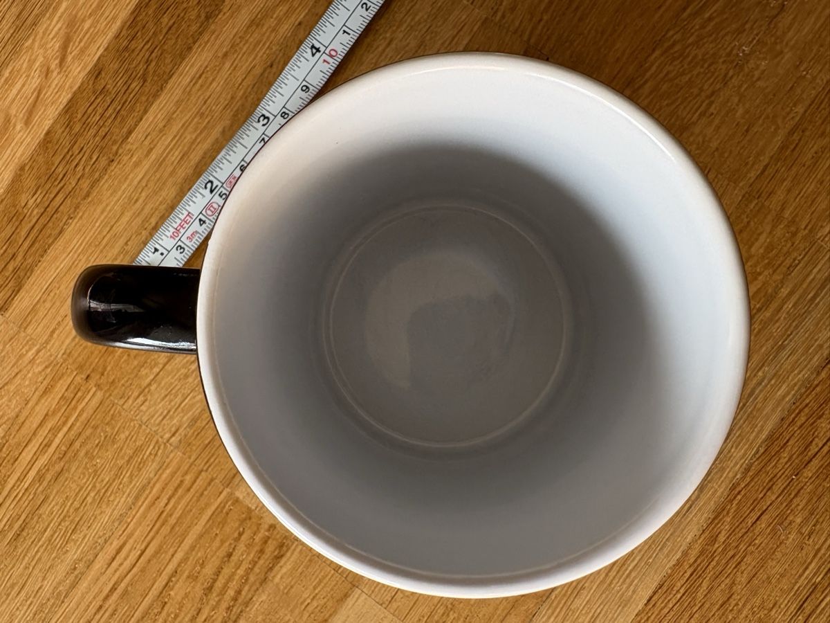 Tazze: Tasse noire avec révélation chaleur – Usato da Fribourg venduto da bappenzell 2