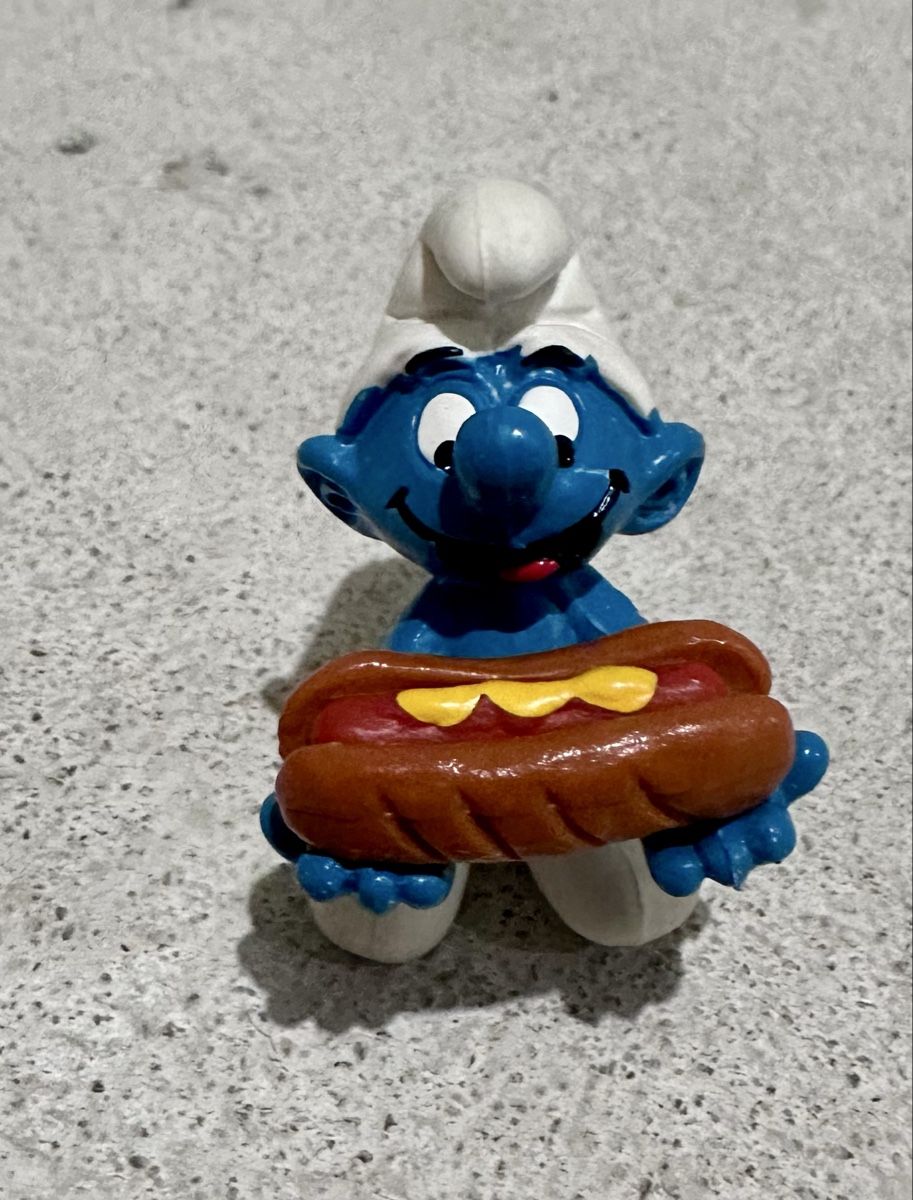 Figurines: Peyo Schlumpf mit Hot Dog – D'occasion à Blumenstein par Thunerin_1987