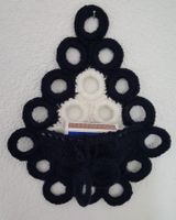 Wandschmuck mit kleiner Tasche