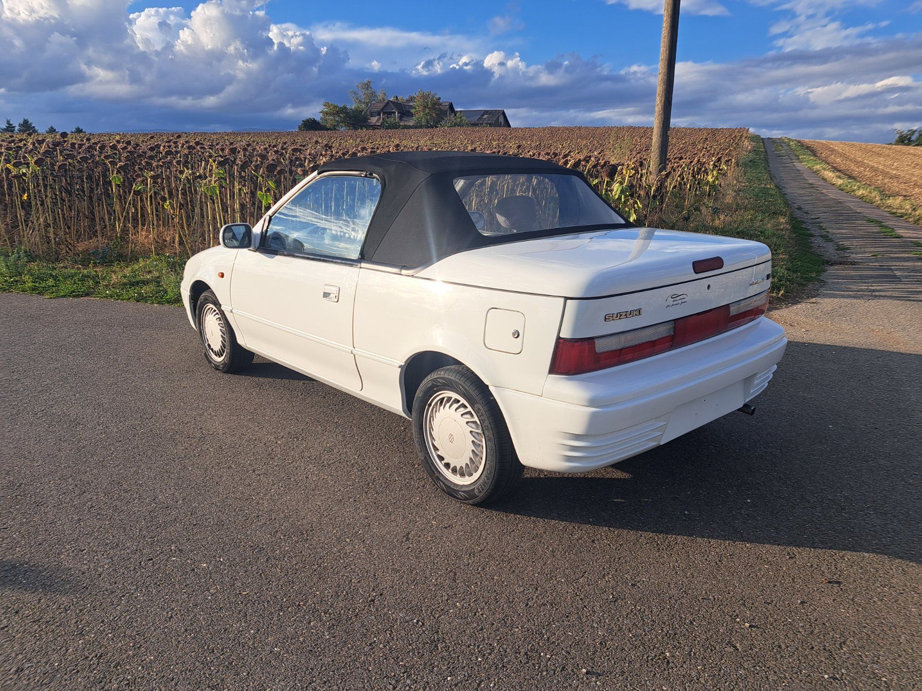 Suzuki Automobili: Cabriolet Suzuki Swift blanc – Usato da Bussigny venduto da pic_zs7v 2
