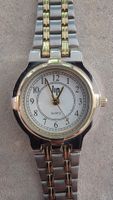 Montre Lip femme bicolore bon état