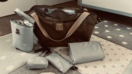 Praktische Wickeltasche von Lässig, neuwertig, viel Zubehör