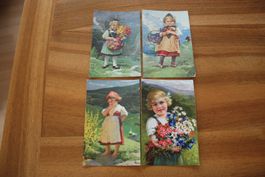 4 alte Postkarten mit Trachtenmädchen