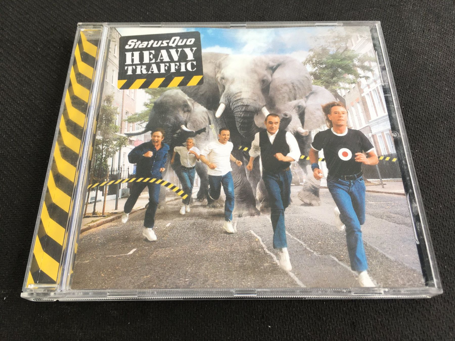 CD: Status Quo - Heavy Traffic -CD- – Usato da St.Gallen venduto da MedienJoe