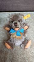 Steiff Ours en peluche, brun avec noeud bleu