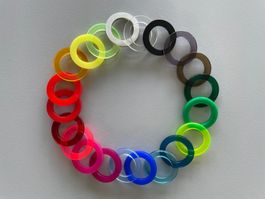 1 Silberring + 20 Plexiglasringe - Grösse 53