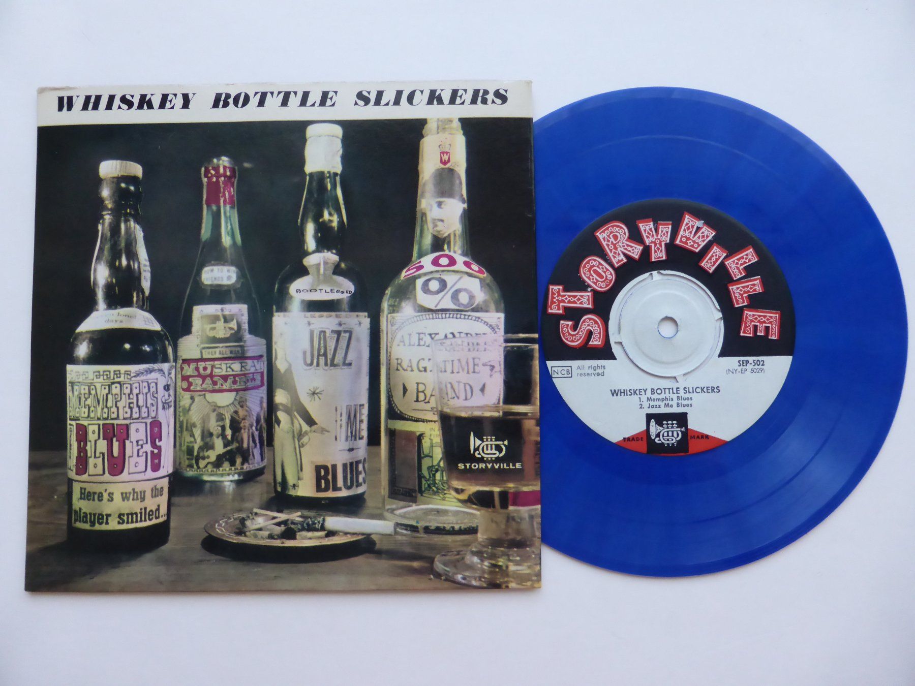 Dischi in vinile: VINYL SINGLE  EP  WHISKEY BOTTLE SLICKERS – Usato da Küssnacht am Rigi venduto da Mondkinder