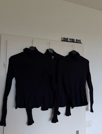 3 Rollkragenpullover