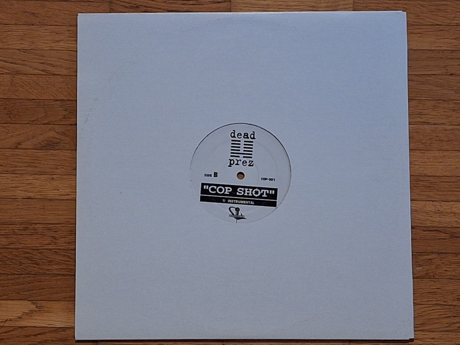 Dischi in vinile: dead prez, Cop Shot - 12" Maxi USA 2000 – Nuovo (secondo la descrizione) da Oberentfelden venduto da Musicud 1