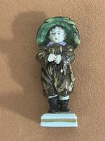Statuetta porcellana raffigurante un bambino