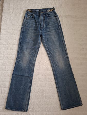 Jean Celine bleu taille 25 orné d'une chaîne dorée