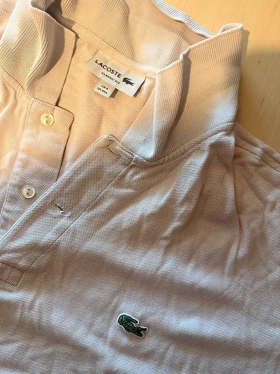 Polo-Shirts: LACOSTE POLOSHIRT CLASSIC FIT Hellrosa – Gebraucht aus Gümligen von dav_s5rr