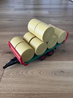 Bruder Anhänger mit zehn Rundballen