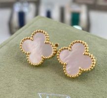 Boucles d'oreilles trèfle rose et or