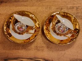 Paar Tassen mit Untertassen, Gold, Rokoko-Dekor