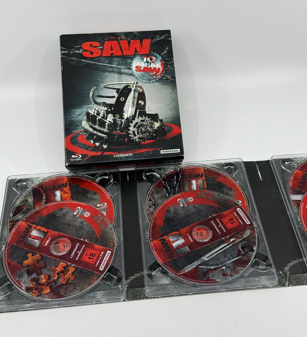 Tutti i DVDs: 10 Jahre SAW (7 Blu-Rays) – Usato da Herisau venduto da Seyashop1 1