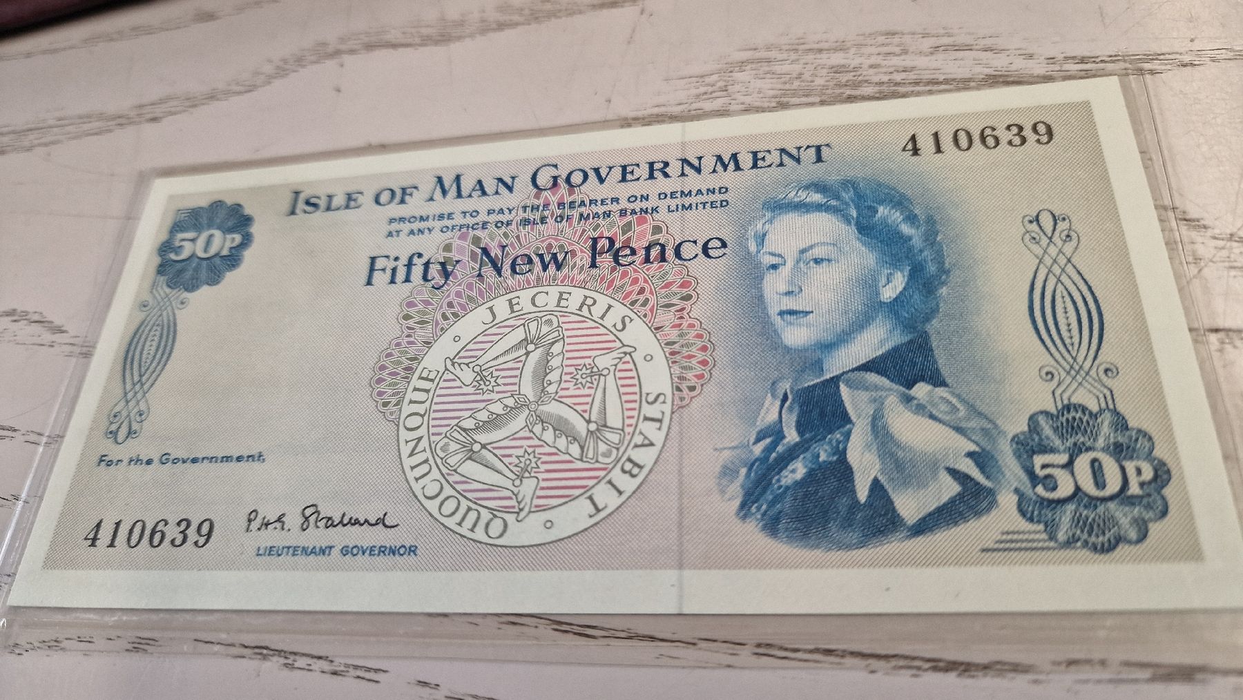 Banconote: Isle of Man 50p Banknote  – Nuovo e nell'imballaggio originale da Herisau venduto da Antiques.AR