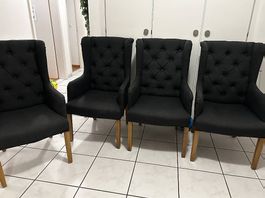 4 Essstühle gepolstert dunkelgrau