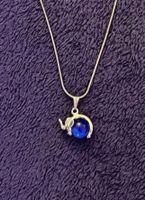 Silberfarbene Kette mit Elefantenanhänger/blaue Kugel