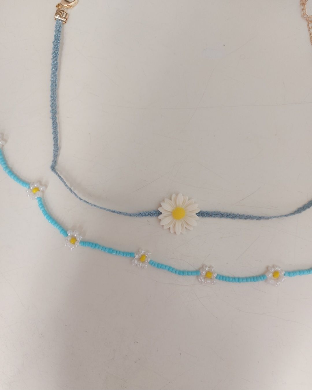 Altri gioielli: Lot de colliers bleus à marguerites – Nuovo (secondo la descrizione) da Le Mont-Pèlerin venduto da jux_x96b 1