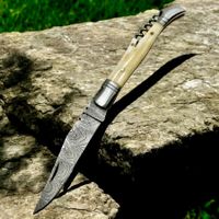 Couteau pliant lame acier Damas et manche en corne