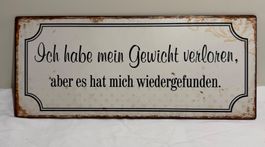 Metallschild mit Spruch