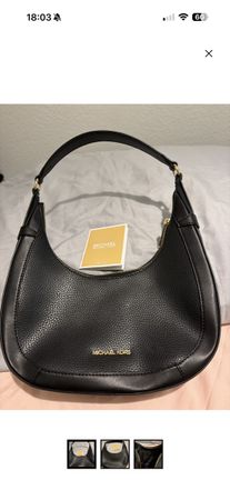 Sac à main Michael Kors noir porté épaule état neuf