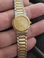 Montre Omega De Ville quartz bicolore or et acier 