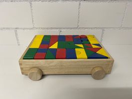 Holzbauklötze mit Ziehwagen