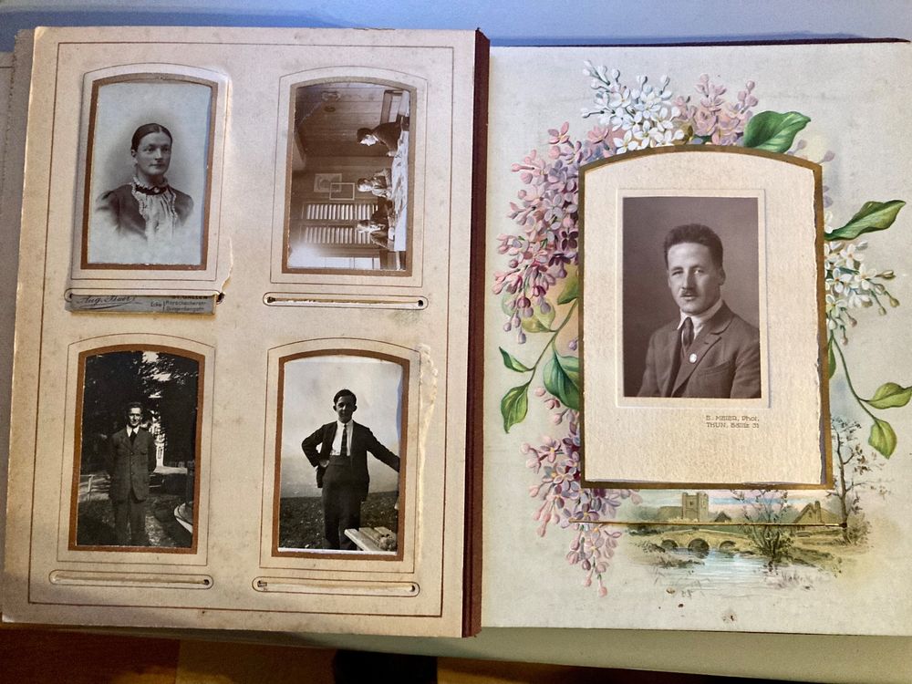 fotoalbum-uralt-mit-vielen-portraits-oder-kabinet-fotos-defekt-in