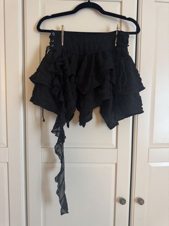 Mini Rock PrettyLittleThing schwarz Grösse 42 Zustand neu