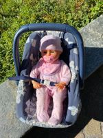 Maxi Cosi mit Puppe