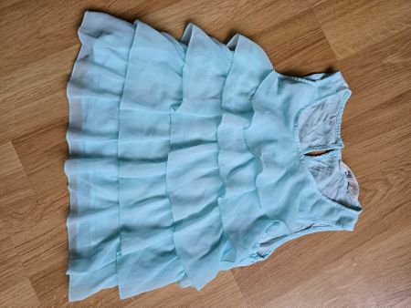 H&M Oberteil hellblau mit Rüschen Grösse 140