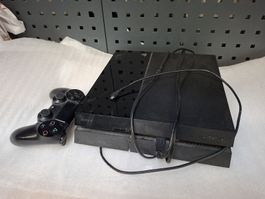 Sony PlayStation 4 schwarz mit Controller