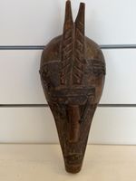 Ancien masque Africain sculpté en bois