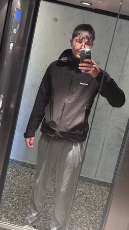 Mammut Regenjacke schwarz Kapuze