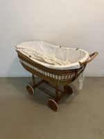 Wicker Bassinet on Wheels
