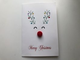 Weihnachtskarte mit Wollnasentier