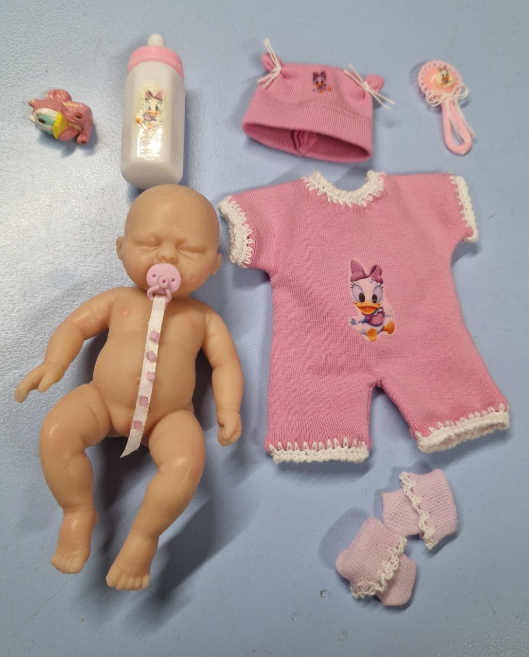 Bambole: Mini bébé en silicone  12 cm Thème DAISY  NEUF – Nuovo e nell'imballaggio originale da St-Imier venduto da goodber 8