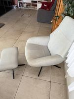 Sessel mit Fußhocker