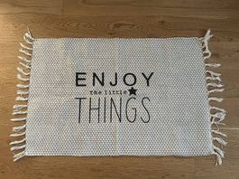 Tappeto decorativo con frange